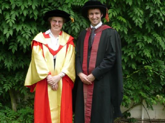 Adair graduating with Prof. Alison Rodger